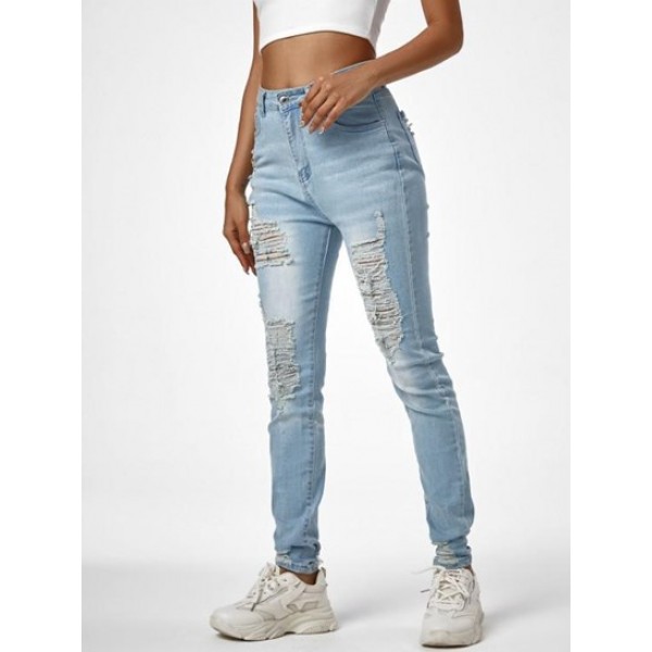 Shredded Distressed Light Wash Skinny Jeans