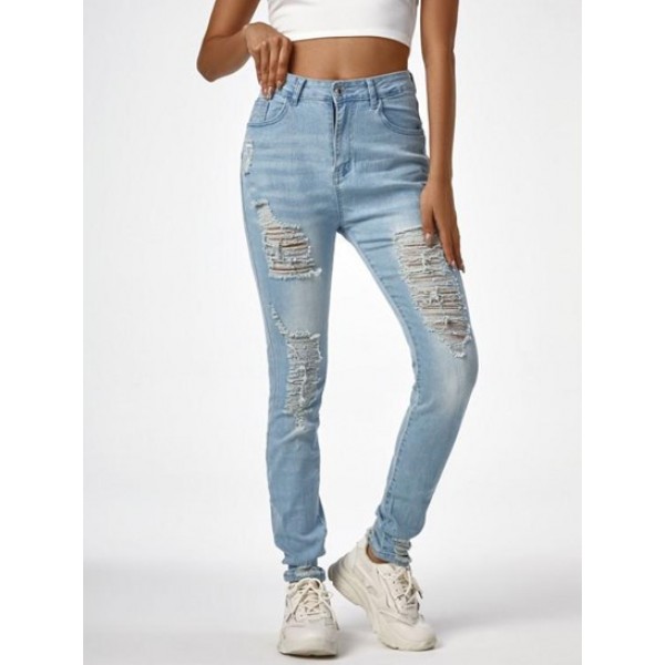 Shredded Distressed Light Wash Skinny Jeans